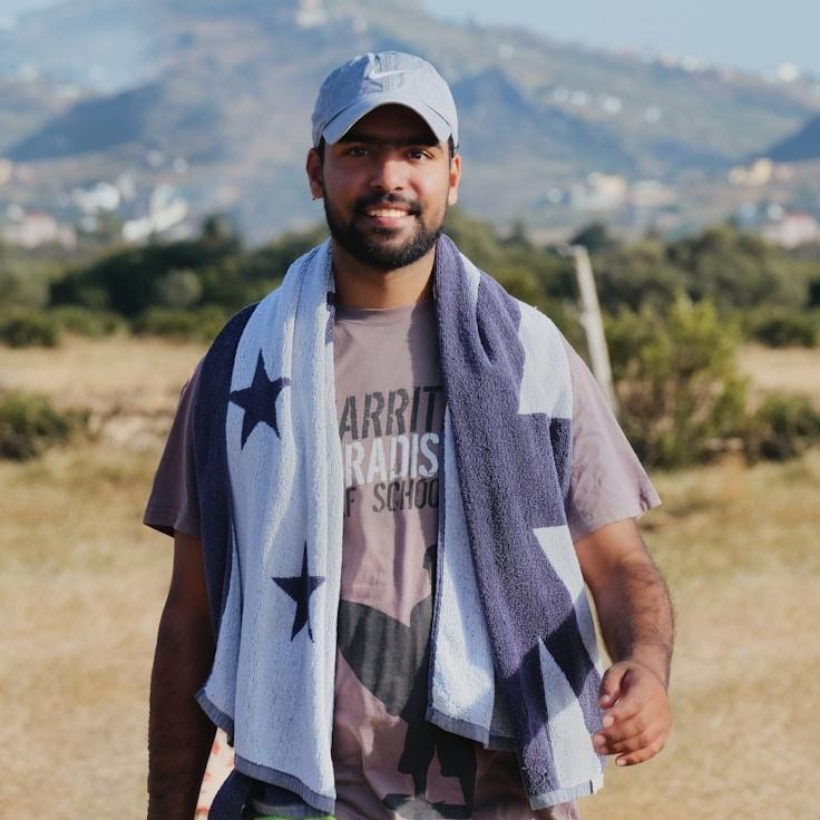 Portrait of Alex, community mentor and Mediterranean cuisine specialist